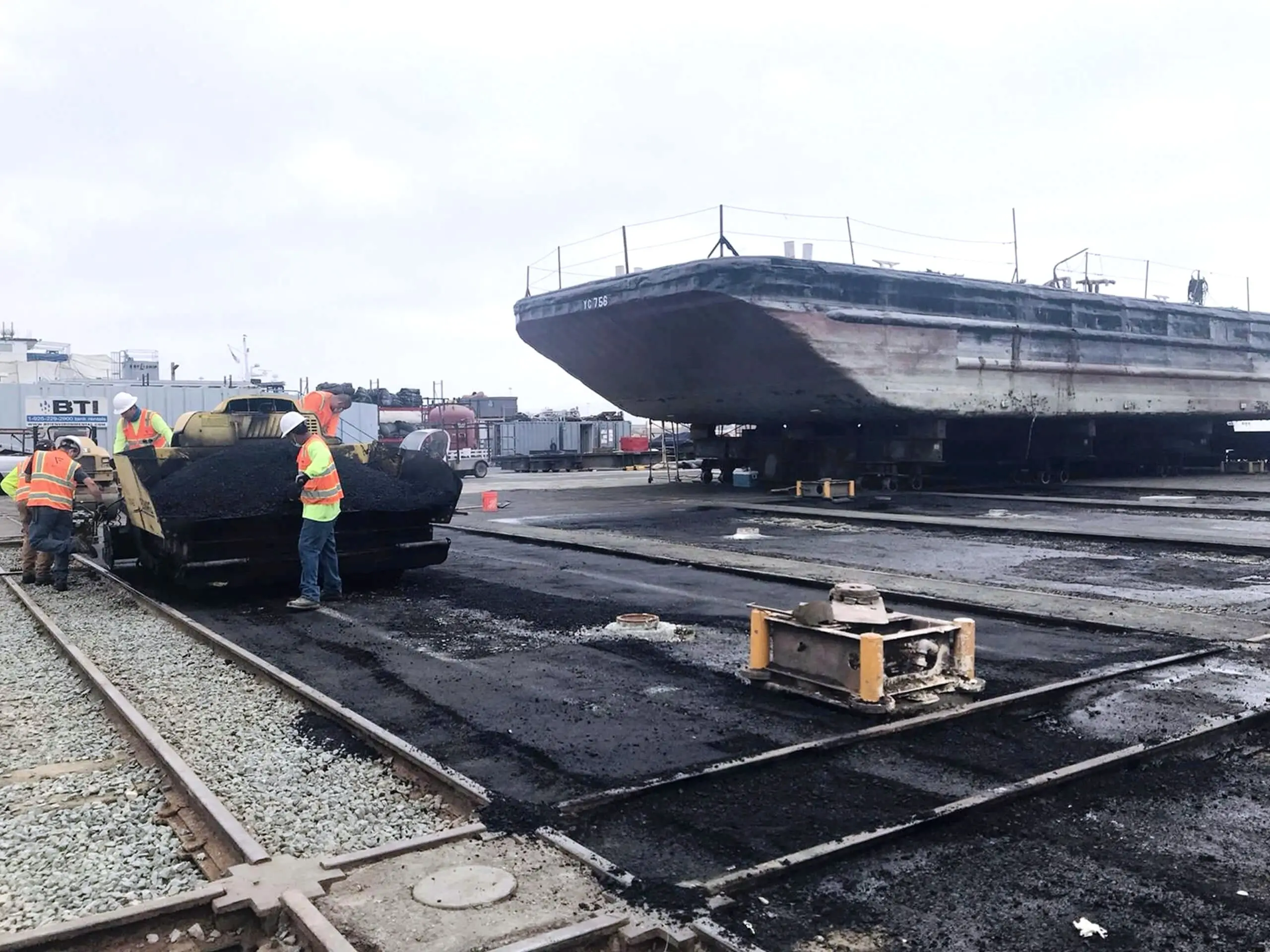 New pavement laid around the rail tracks and dock furniture at the Alameda yard.