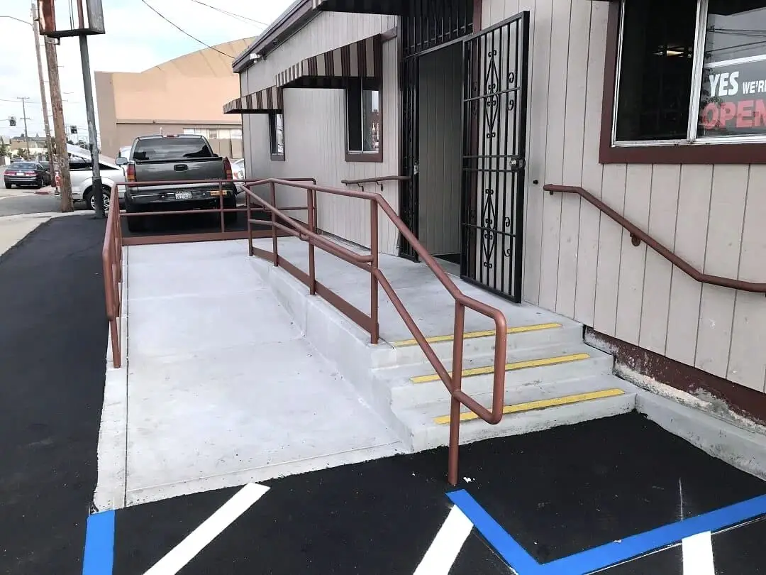 Accessible route, ramp and handrail at a Bay Area commercial property following ADA improvement work.