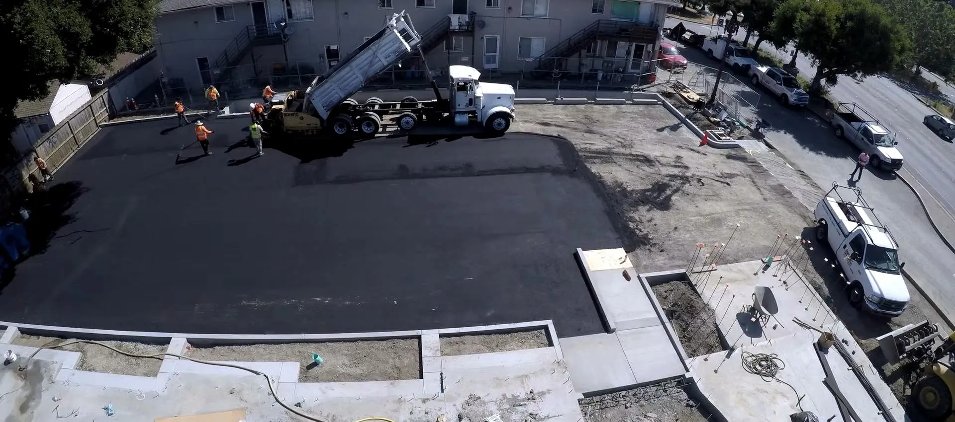 Aerial view of a Forticon paving operation on a Bay Area commercial site.