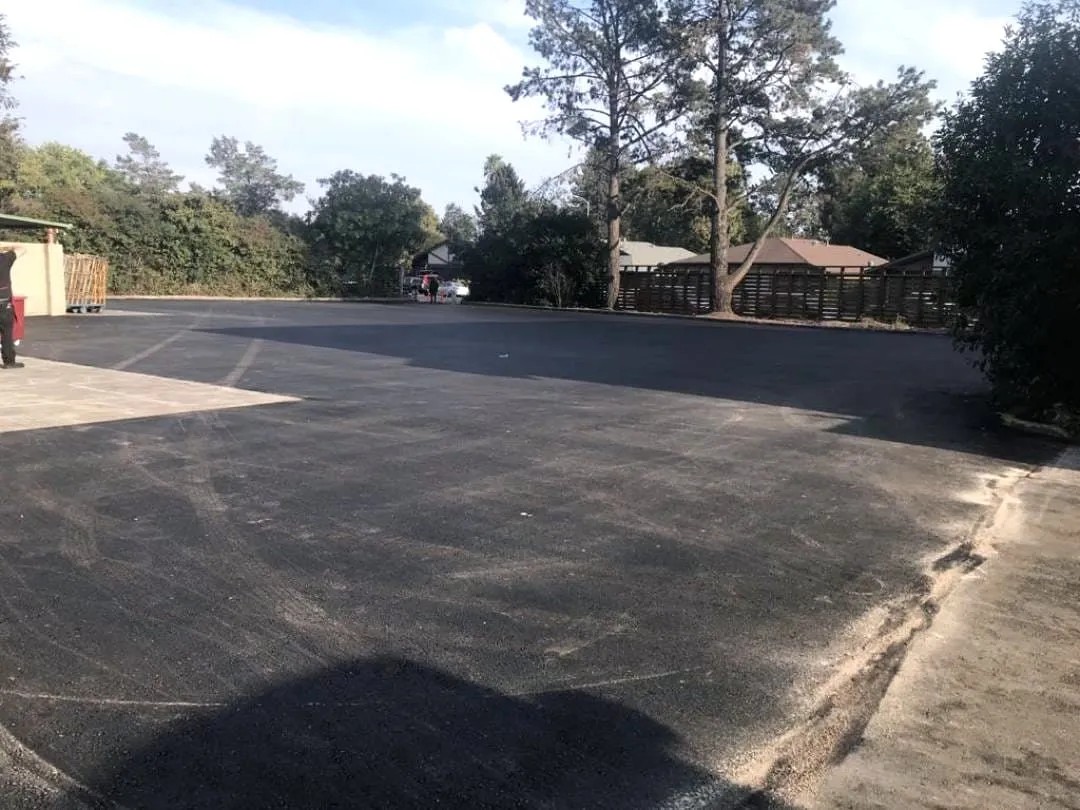 The resurfaced parking field at Rancho Cotati Shopping Center, open and clear after grinding and repaving.