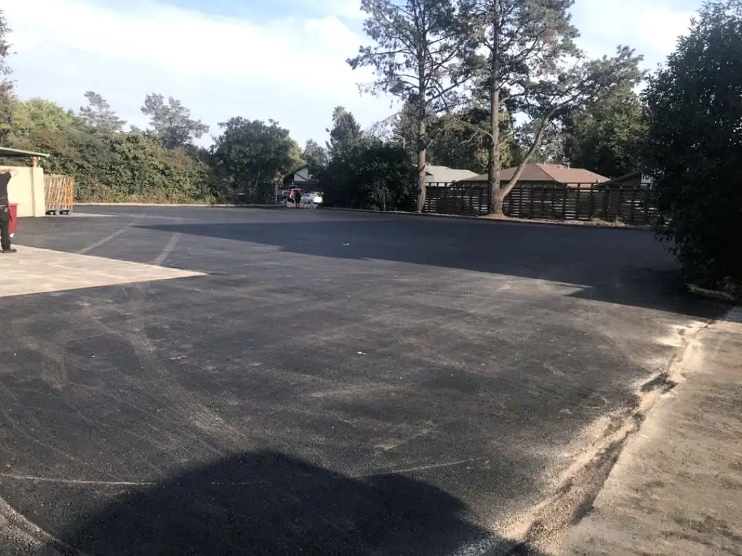 The resurfaced parking field at Rancho Cotati Shopping Center, open and clear after grinding and repaving.