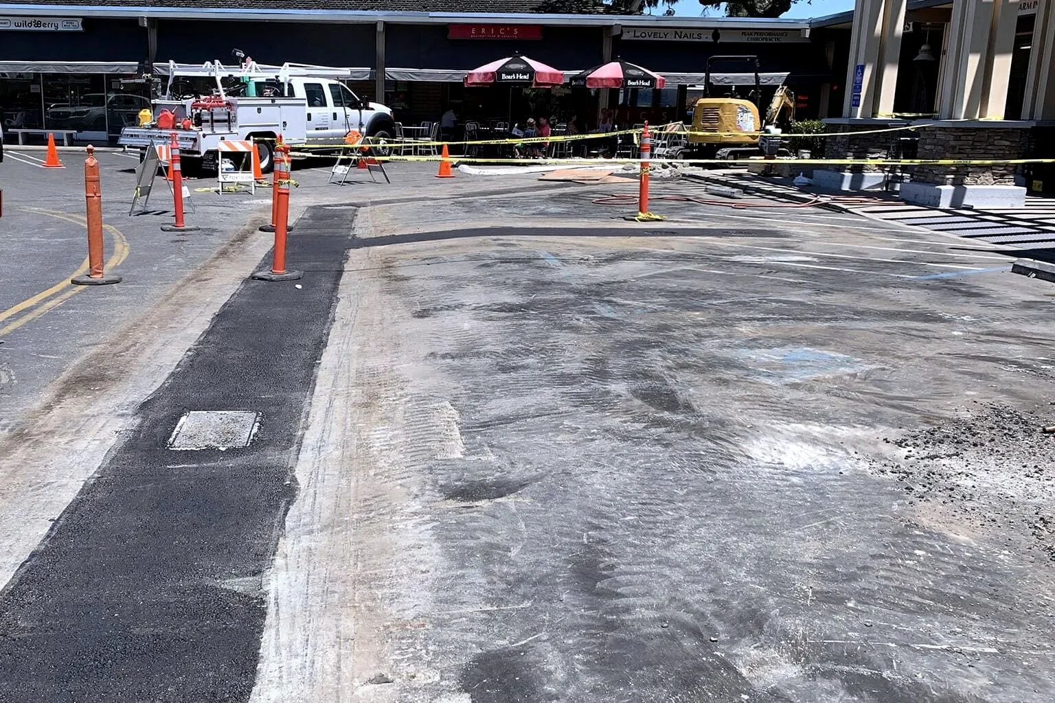 Trench patch repair being prepared and paved on a Bay Area commercial site.